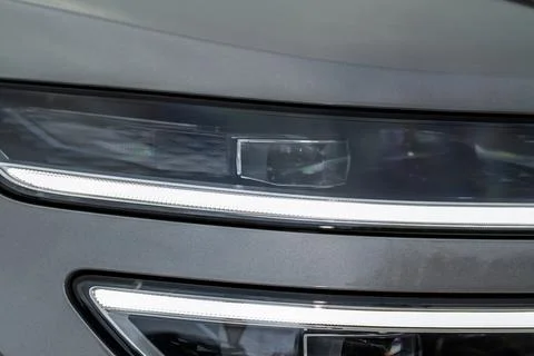 Modern car headlight close up view. LED Headlight of a car. Foto stock