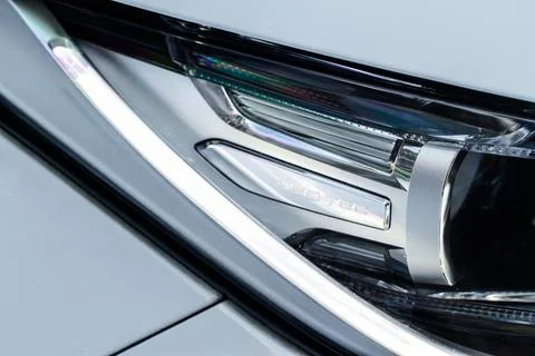 Modern car headlight close up view. LED Headlight of a car. Stock Photos