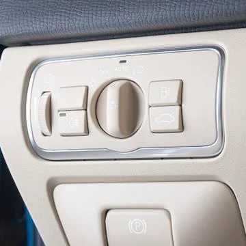 Modern car headlight controls. Stock Photos