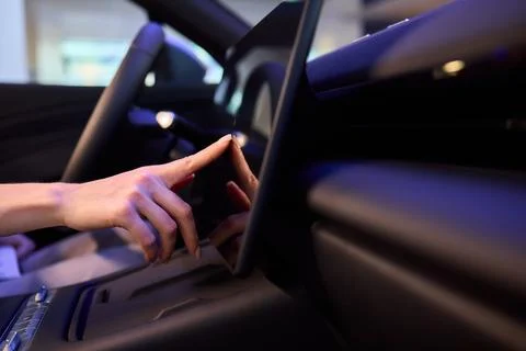 A modern car interior with advanced touchscreen controls enhances user Stock Photos