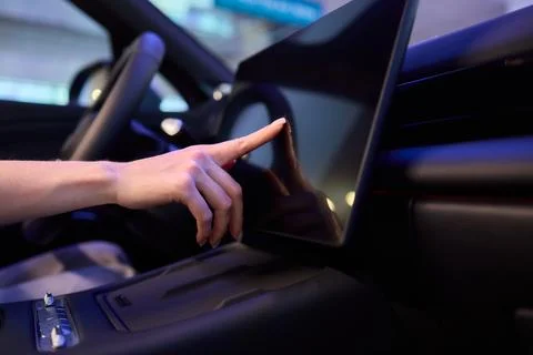 A modern car interior with advanced touchscreen controls enhances user Stock Photos