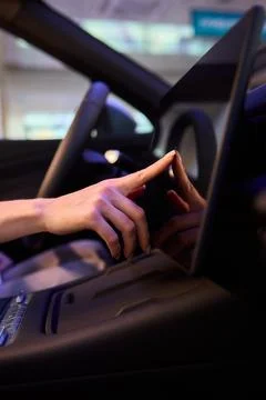 A modern car interior with advanced touchscreen controls enhances user Stock Photos