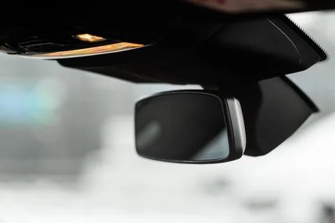 Modern car interior close up view with metallic and plastic details. Interior Stock Photos