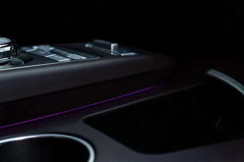Modern car interior close up view with metallic and plastic details. Interior Stock Photos