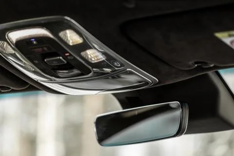 Modern car interior close up view with metallic and plastic details. Interior Stock Photos
