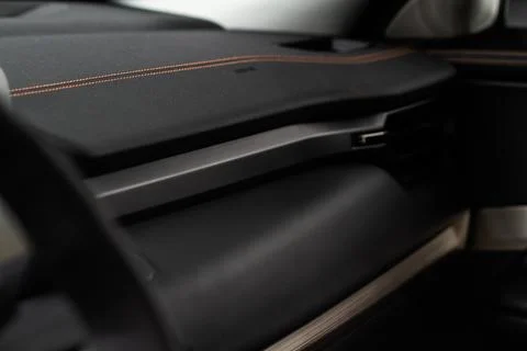 Modern car interior close up view with metallic and plastic details. Interior Stock Photos