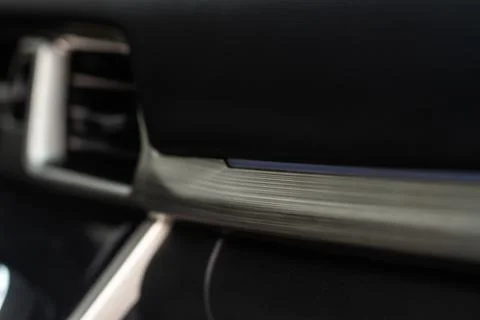 Modern car interior close up view with metallic and plastic details. Interior Stock-Fotos