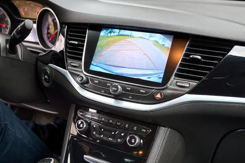 Modern car interior, dashboard close up view showcasing multimedia display sh Stock Photos