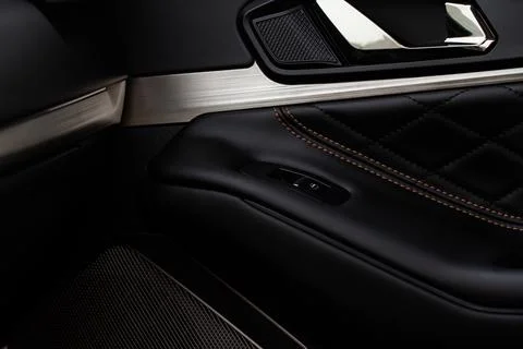 Modern car interior door panel. Car detailing. Stock Photos