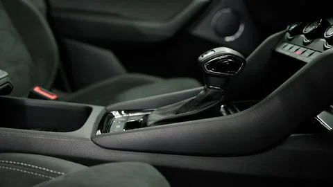 Modern car interior showing automatic gear stick and controls Stock Photos