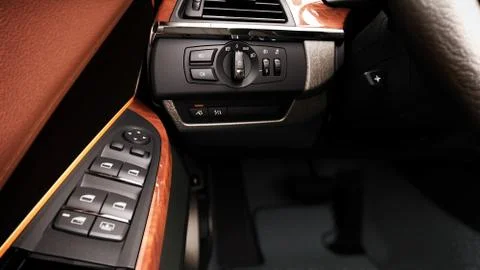 Modern car interior view of the control panel lifting windows and turning on  스톡 일러스트