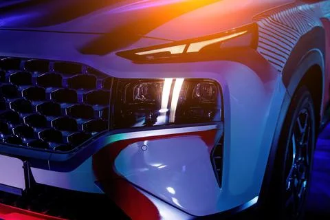 Modern car led headlight close up. Stock Photos