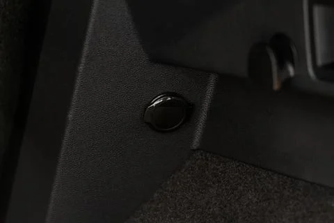 Modern car outlet socket. Closed 12V power outlet socket. Stock Photos