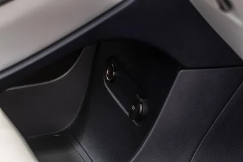 Modern car outlet socket. Closed 12V power outlet socket. Stock Photos