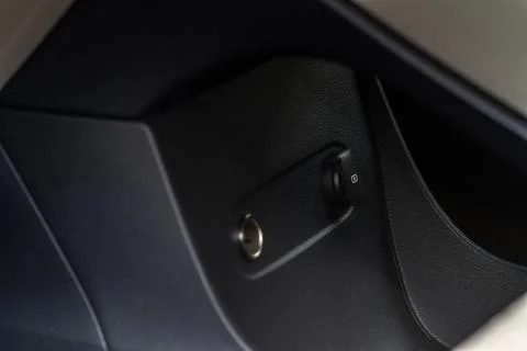 Modern car outlet socket. Closed 12V power outlet socket. Stock Photos