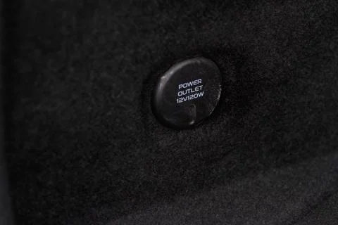 Modern car outlet socket. Closed 12V power outlet socket. Foto stock