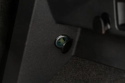 Modern car outlet socket. Opened 12V power outlet socket. Stock Photos