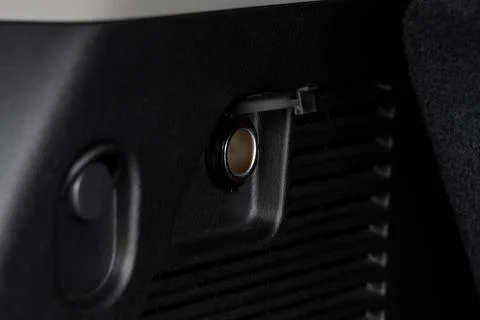 Modern car outlet socket. Opened 12V power outlet socket. Stock Photos