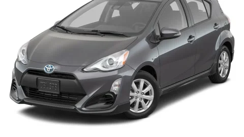 Modern car in studio Magnetic Gray Metallic 2017 Toyota Prius C Three Stock Footage 159936598