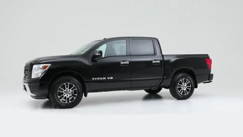 Modern car in studio rotation shot Black 2020 Nissan Titan SV Stock Footage 159373628
