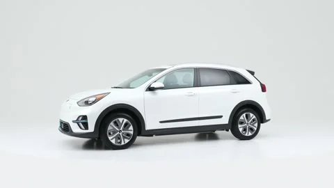 Modern car in studio rotation shot Brilliant Silver 2019 Kia Niro EV EX Premium Stock Footage 159377923