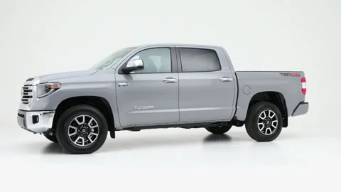 Modern car in studio rotation shot Solid Red 2019 Toyota Tundra Limited Stock Footage 159381289