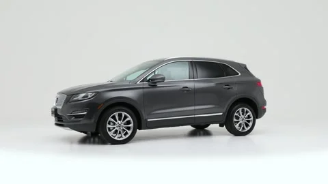 Modern car in studio rotation shot Crystal White Pearl 2019 Lincoln MKC Select Stock Footage 159381874