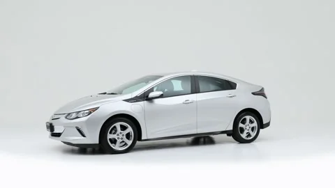 Modern car in studio rotation shot Firenze Red Metallic 2018 Chevrolet Volt LT Stock Footage 159383943