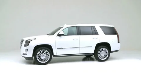 Modern car in studio rotation shot Gun Metallic 2017 Cadillac Escalade Platinum Stock Footage 159385972