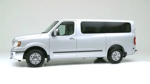 Modern car in studio rotation shot Ingot Silver 2016 Nissan NV3500 Passanger SL Stock Footage 159387035