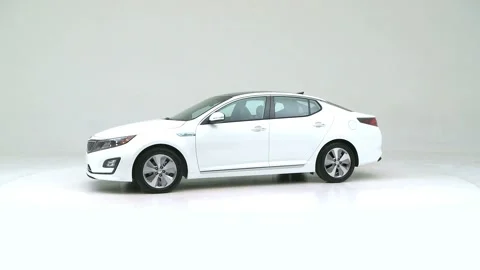 Modern car in studio rotation shot Lunar Blue Metallic 2016 Kia Optima Hybrid EX Stock Footage 159387957