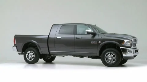 Modern car in studio rotation shot Navarra Blue Metallic 2016 RAM 2500 Laramie Video stock 159530302