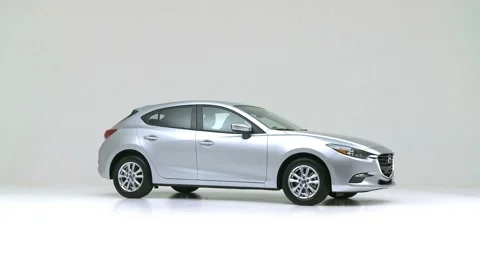 Modern car in studio rotation shot Onyx Black 2017 Mazda MAZDA3 Sport Stock Footage 159530996