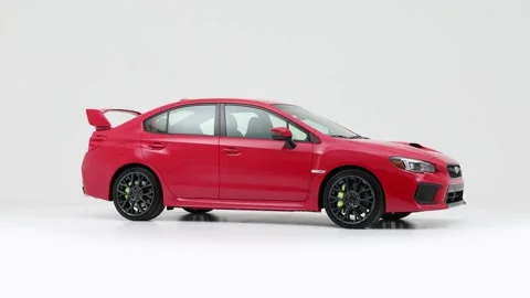Modern car in studio rotation shot Summit White 2019 Subaru WRX STI Stock Footage 159535228