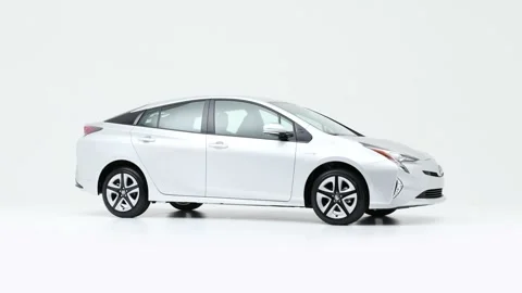 Modern car in studio rotation shot Billet 2018 Toyota Prius Three Touring Stock Footage 159536752