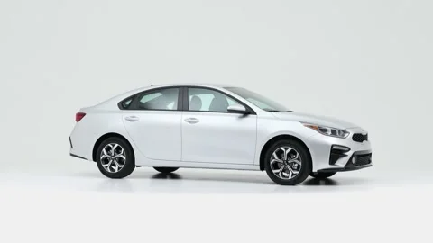 Modern car in studio rotation shot Alpine White 2019 Kia Forte LXS Stock-Footage 159537233