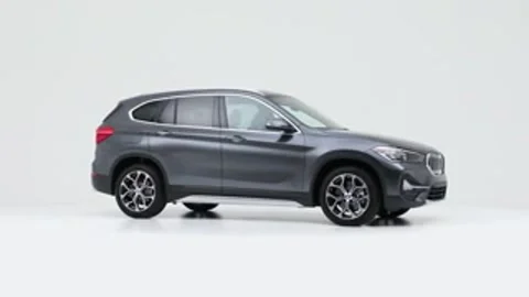Modern car in studio rotation shot Anodized Blue Metallic 2020 BMW X1 xDrive28i Stock Footage 159537324