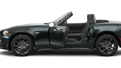 Modern car in studio side view Nero Cinema 2017 Fiat 124 Spider Abarth Stock Footage 159925282