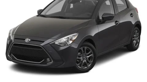 Modern car in white studio front view Graphite 2020 Toyota Yaris LE Stock Footage 160090807