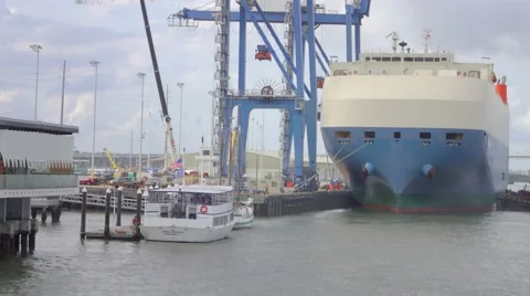 Modern Cargo Ship Coming Into Sea Port Stock Footage