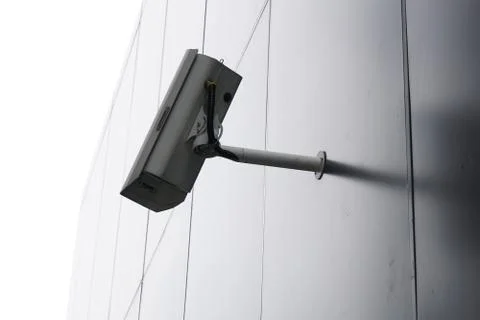 Modern cctv camera attach to the wall. Concept of surveillance and monitoring Stock Photos