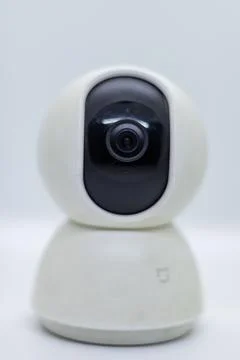 Modern CCTV security camera closeup on white background Stock Photos