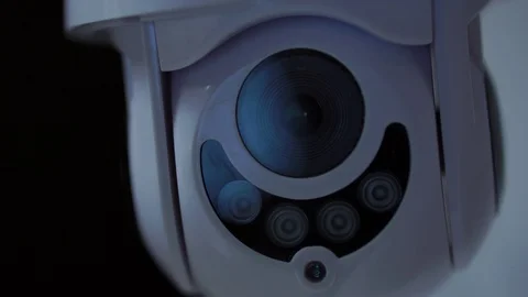 Modern Cctv Security Camera Rotates At Night, 4K Surveillance Stock Footage 129896903
