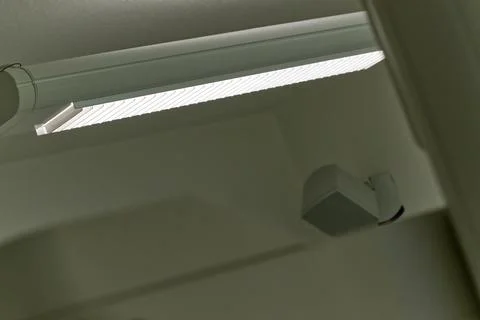 Modern Ceiling Light Fixture in Minimalist Interior Stock Photos