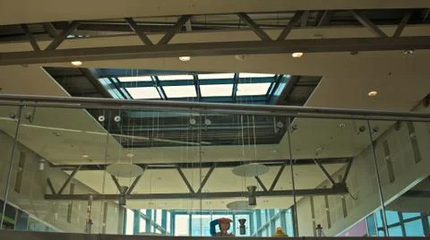 Modern ceiling in mall with doll saluting Stock Photos