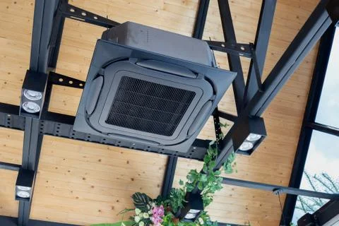 Modern ceiling mounted cassette type air conditioning system in coffee shop 스톡 사진