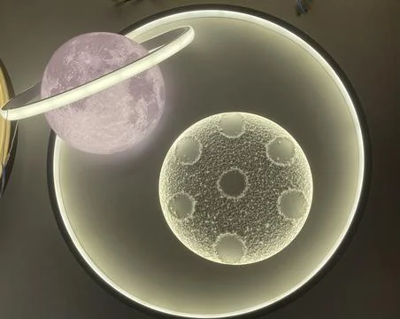 Modern Celestial Planet and Moon LED Light Fixture Fotos Stock