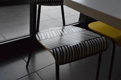 Modern chair with striped pattern Stock Photos