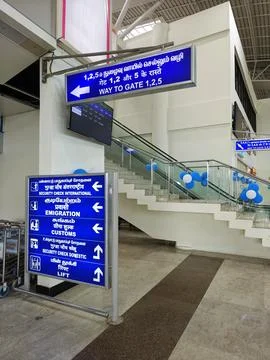 Modern check in counters and spacious terminal interior at Madurai Airport. 库存照片