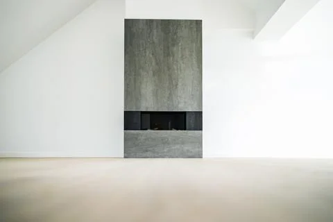 A modern chimney in an empty room Stock Photos